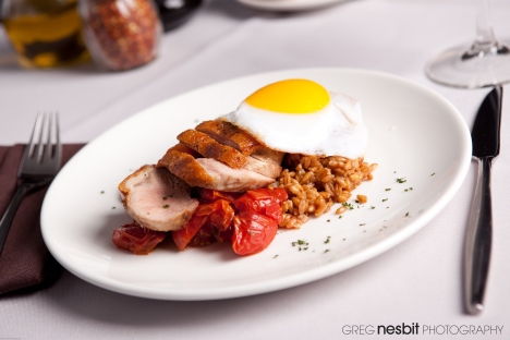 Roasted Duck Breast over wild mushroom and sage butter farro; topped with an over-easy duck egg