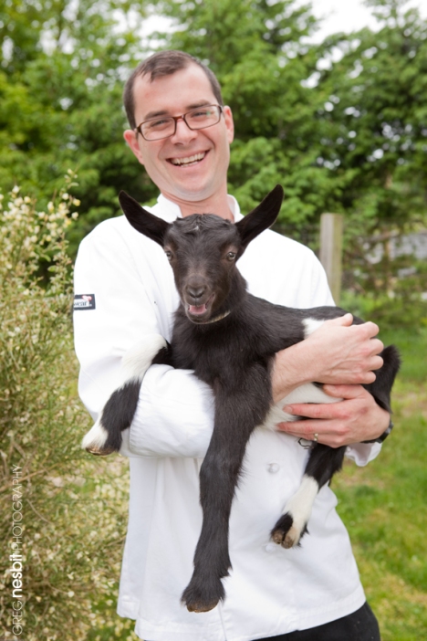 Chef Noah Schwartz with baby goat at Catapano Dairy Farm, Peconic, NY